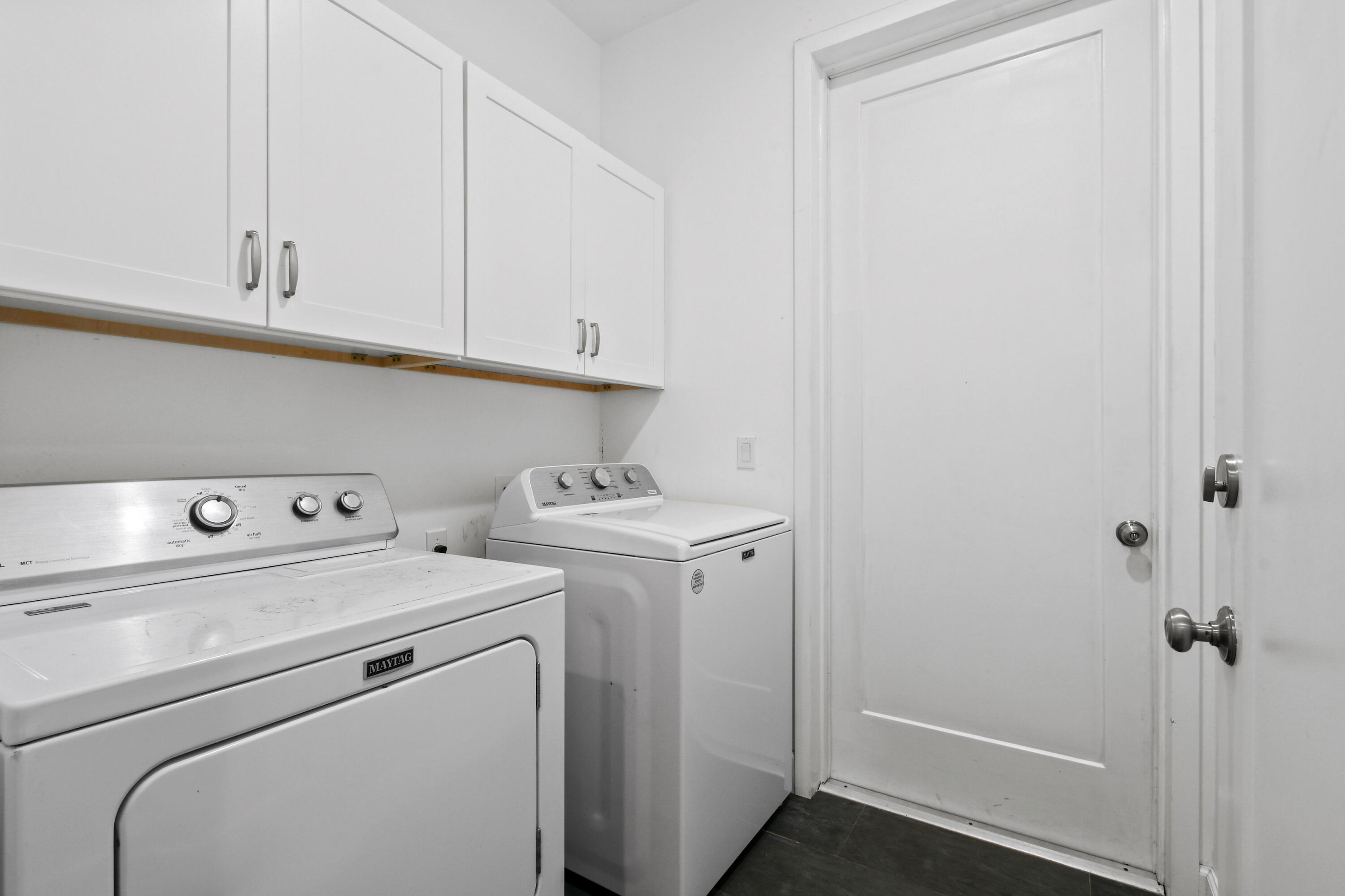 5782 Russakis Road Fort Pierce, FL 34951 - Photo 33 of 90 a utility room with dryer and washer