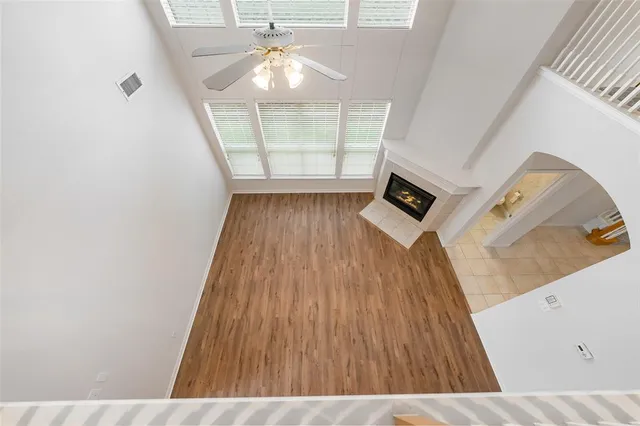 a view of a livingroom with wooden floor