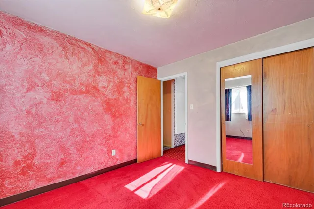 a view of a hallway with staircase