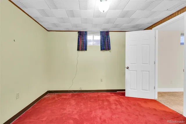 a kitchen with stainless steel appliances granite countertop a stove top oven a sink and a microwave