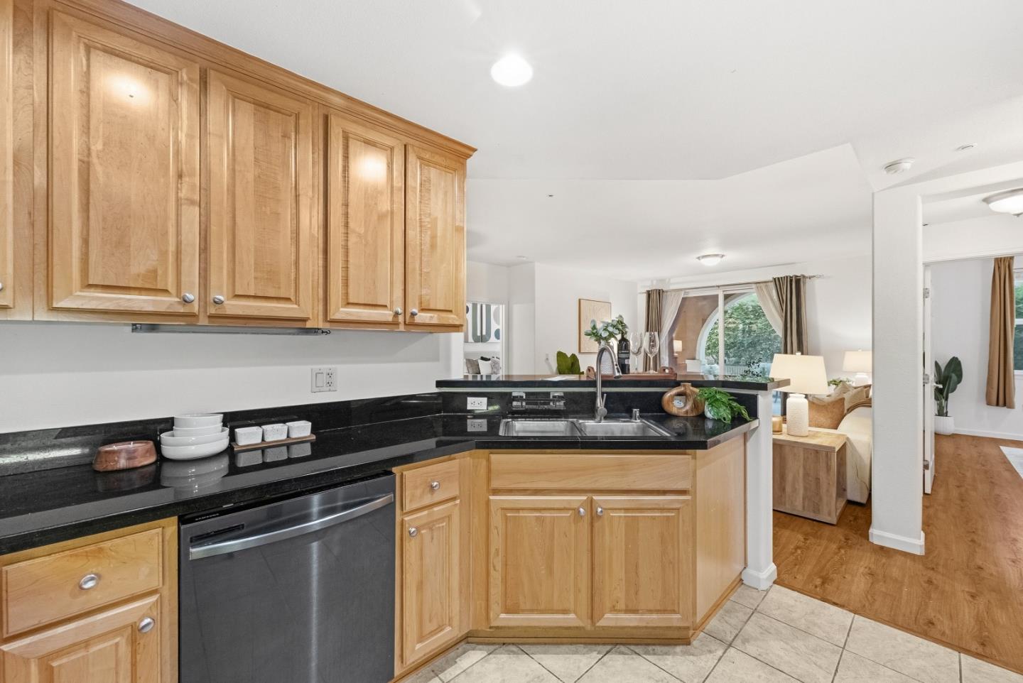 1390 Saddle Rack Street, Unit 223 San Jose, CA 95126 - Photo 10 of 36 a kitchen with stainless steel appliances granite countertop a sink and cabinets