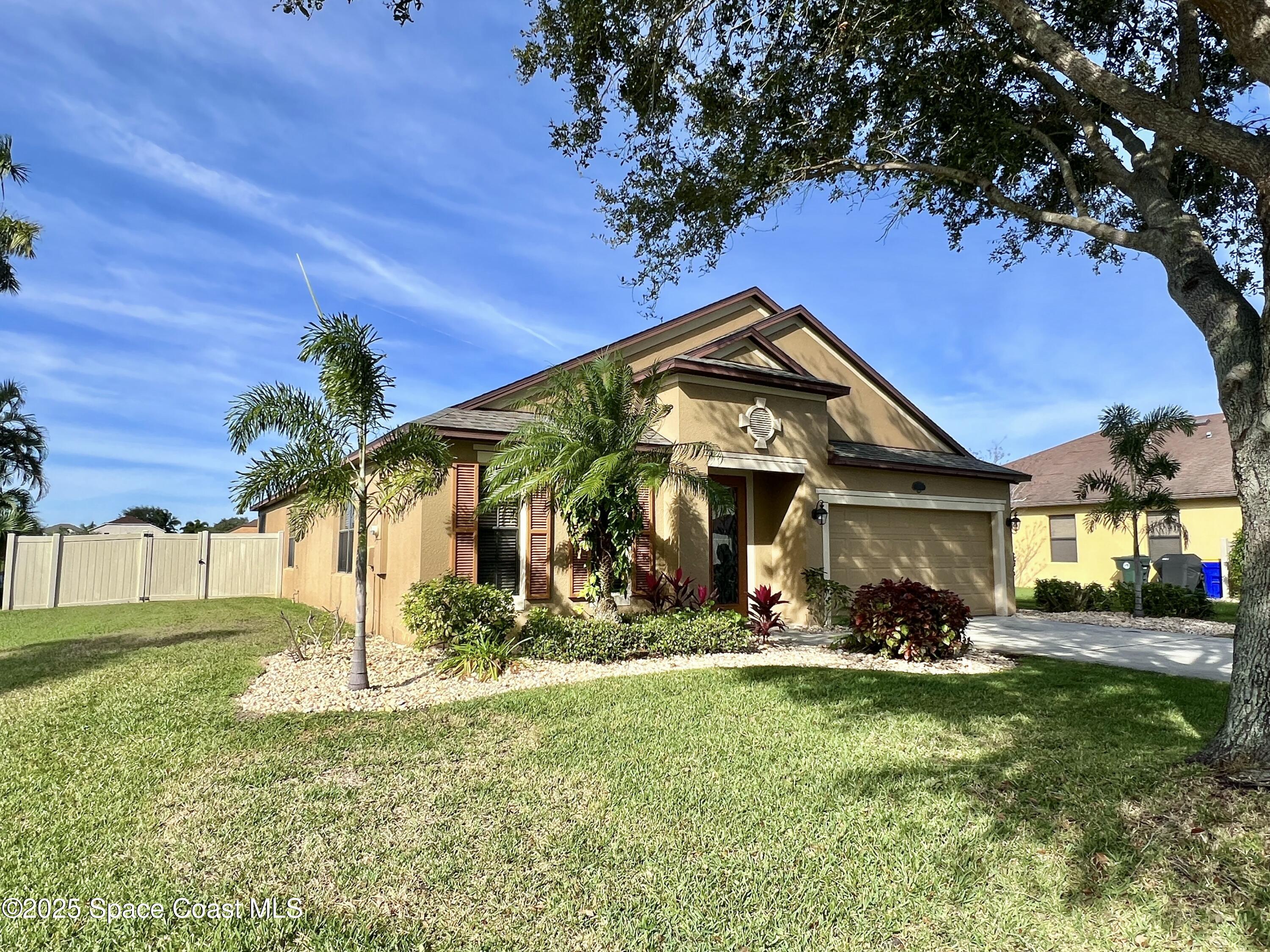 909 Whetstone Place Rockledge, FL 32955 - Photo 1 of 23 Front