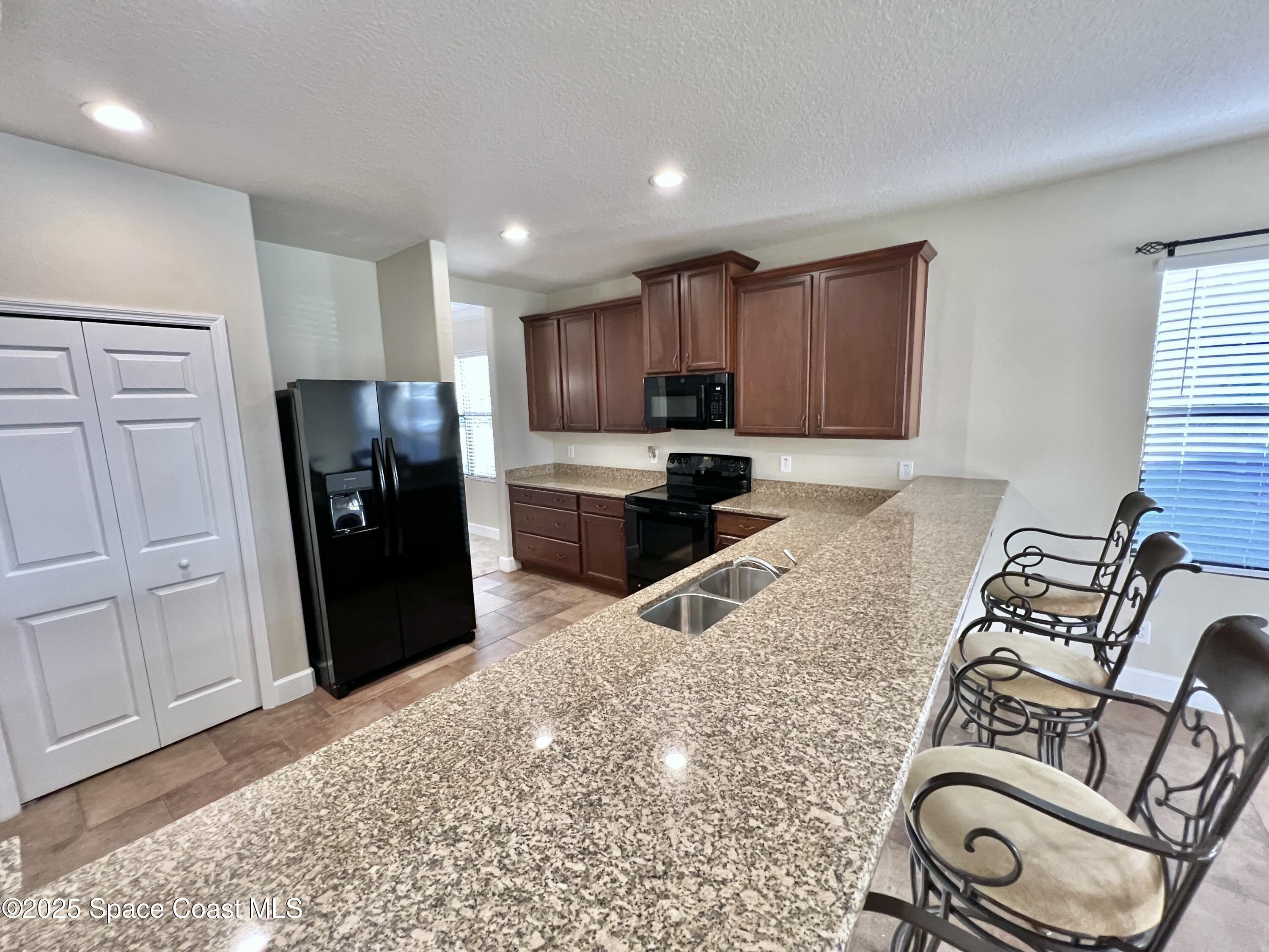 909 Whetstone Place Rockledge, FL 32955 - Photo 12 of 23 Granite Tops