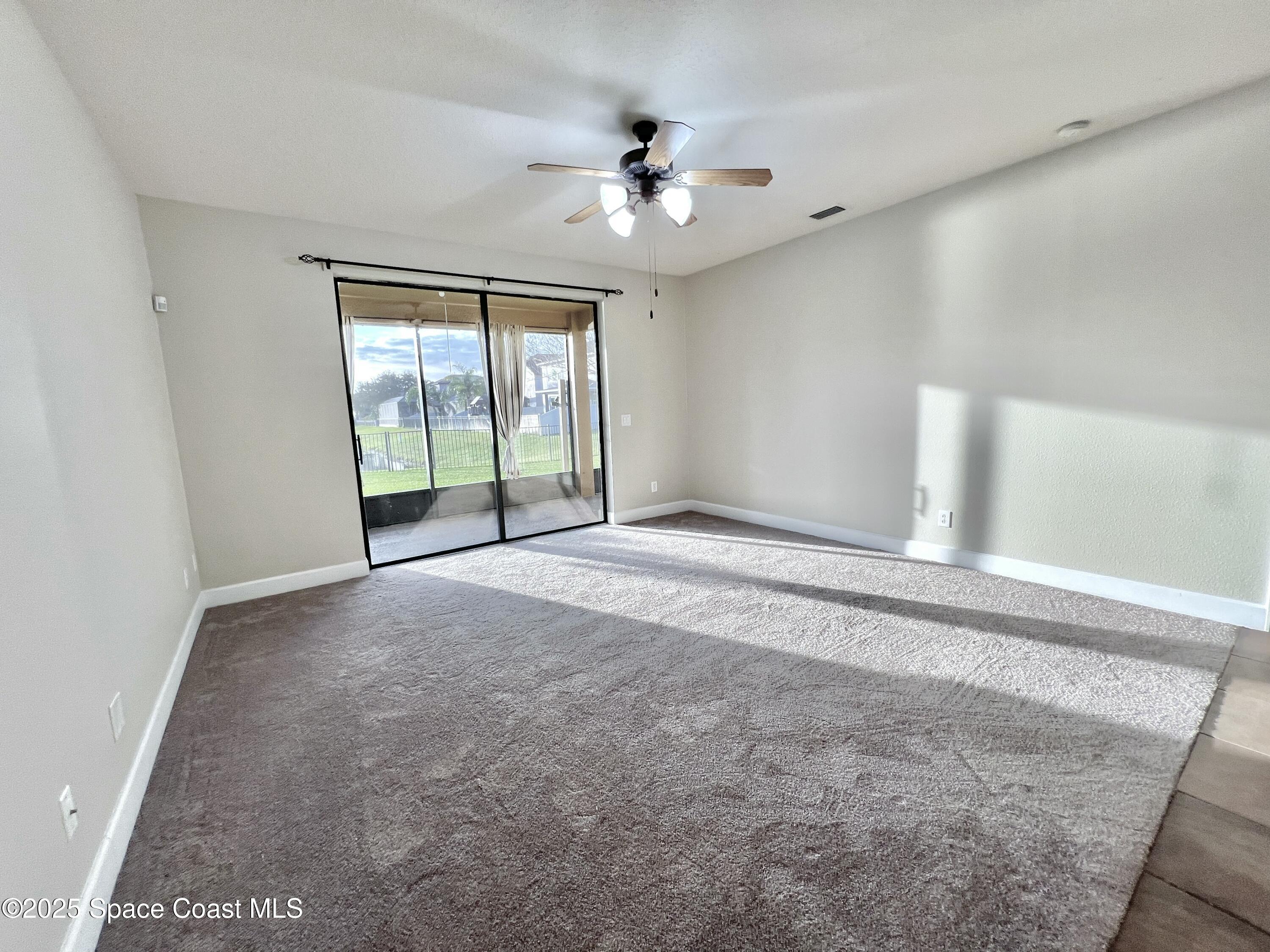 909 Whetstone Place Rockledge, FL 32955 - Photo 15 of 23 Family Room