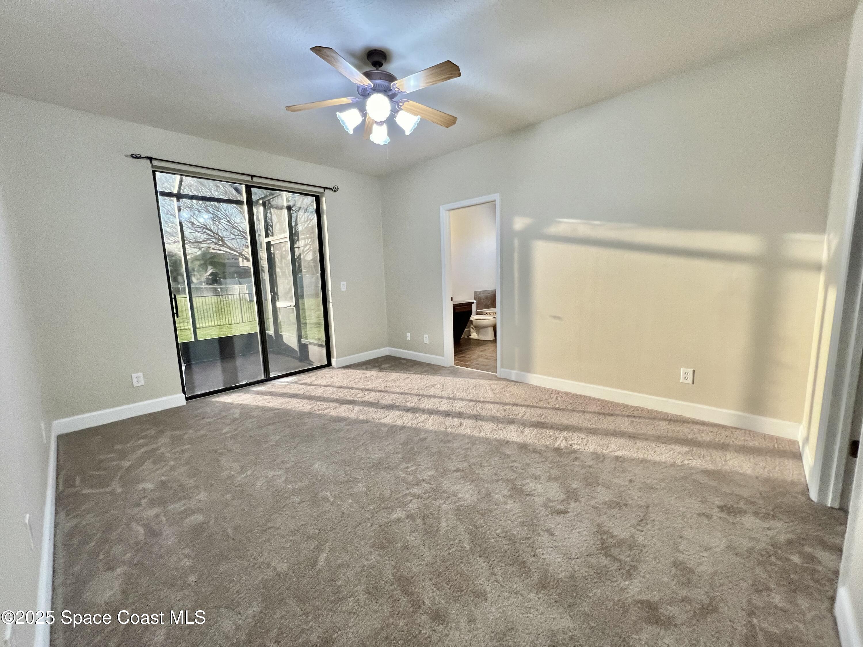 909 Whetstone Place Rockledge, FL 32955 - Photo 16 of 23 Primary Bedroom