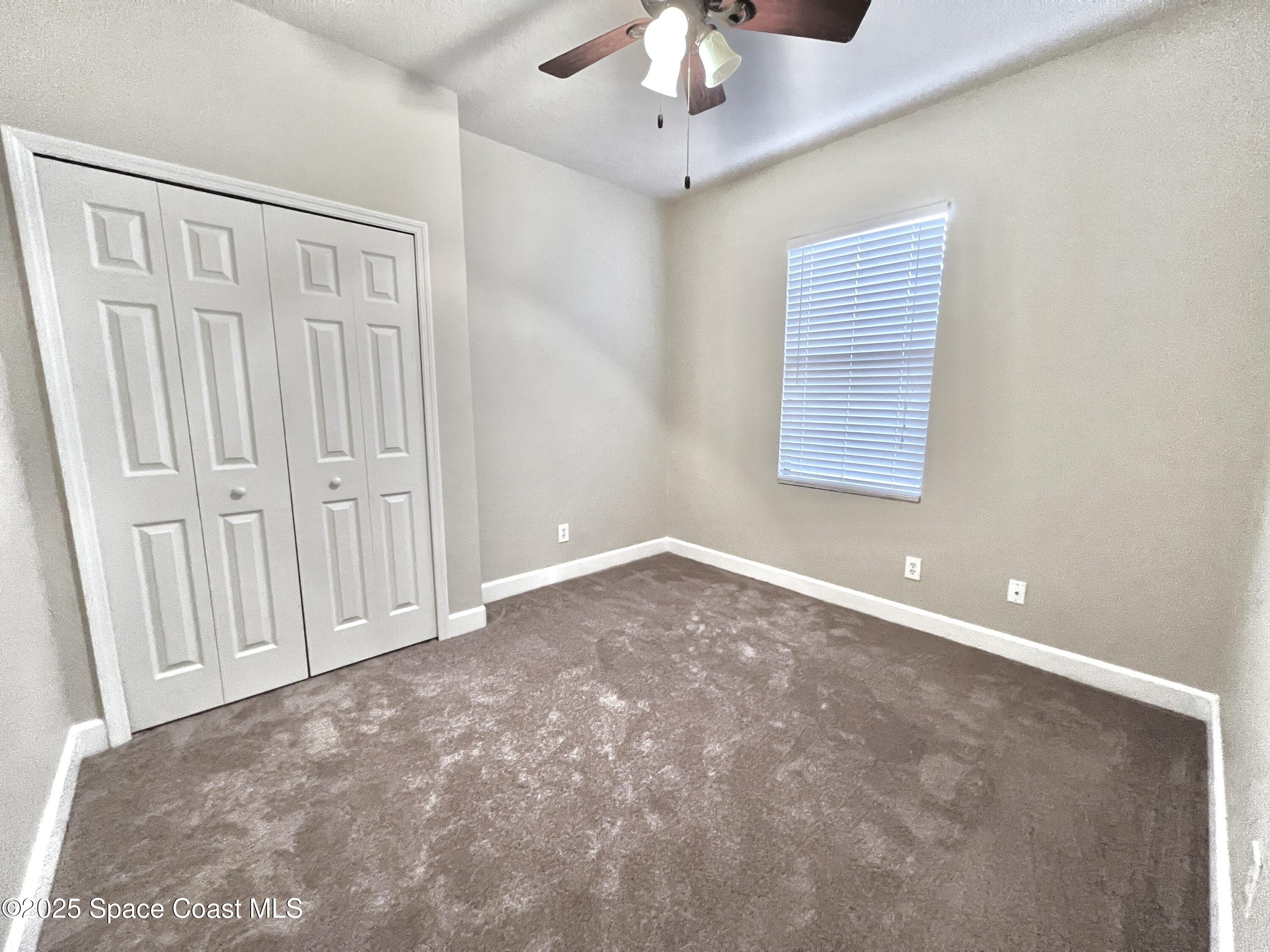 909 Whetstone Place Rockledge, FL 32955 - Photo 19 of 23 Bedroom 2