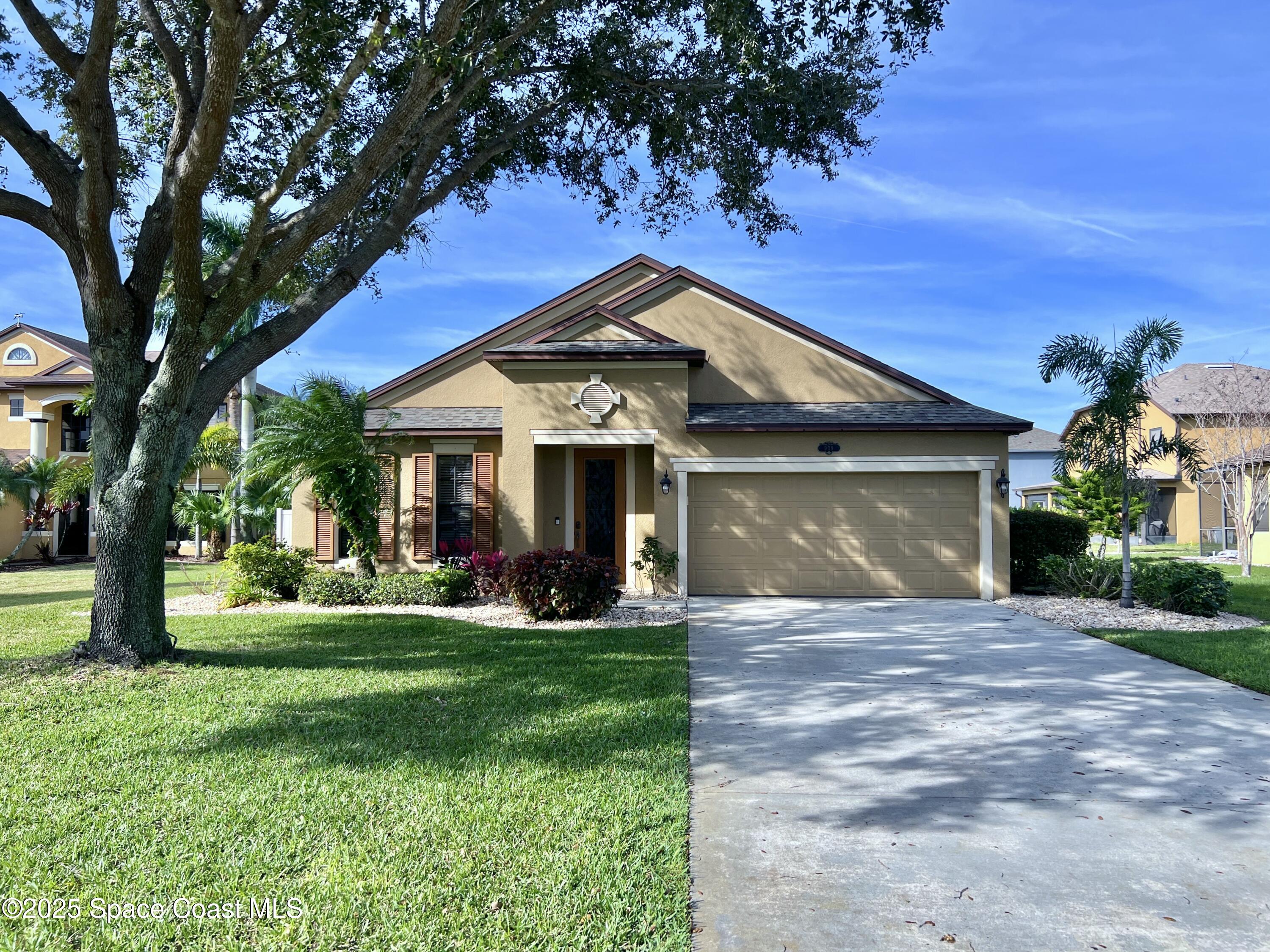 909 Whetstone Place Rockledge, FL 32955 - Photo 2 of 23 Long Driveway!