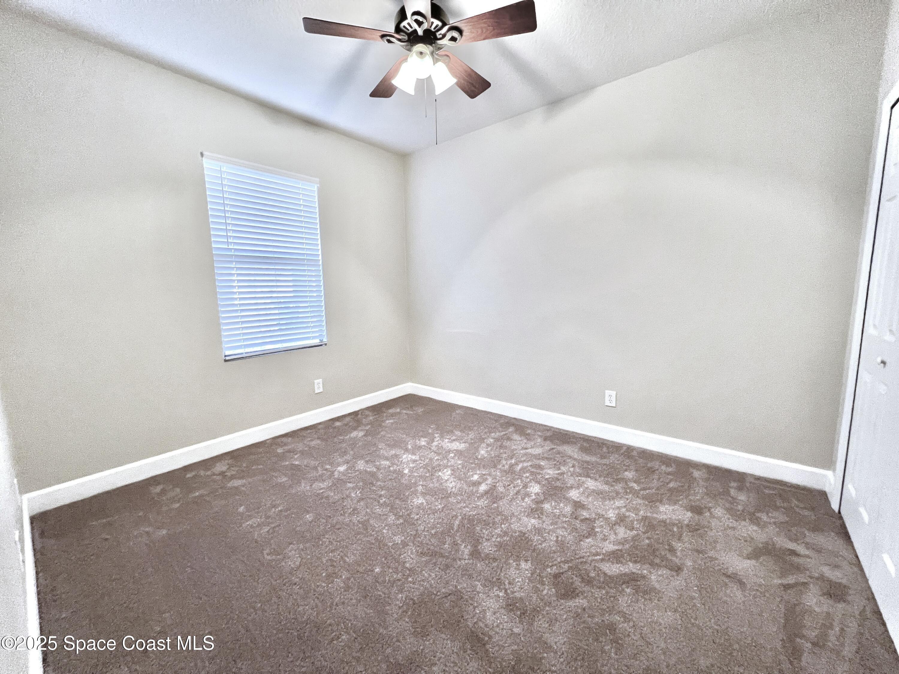 909 Whetstone Place Rockledge, FL 32955 - Photo 22 of 23 Bedroom 3