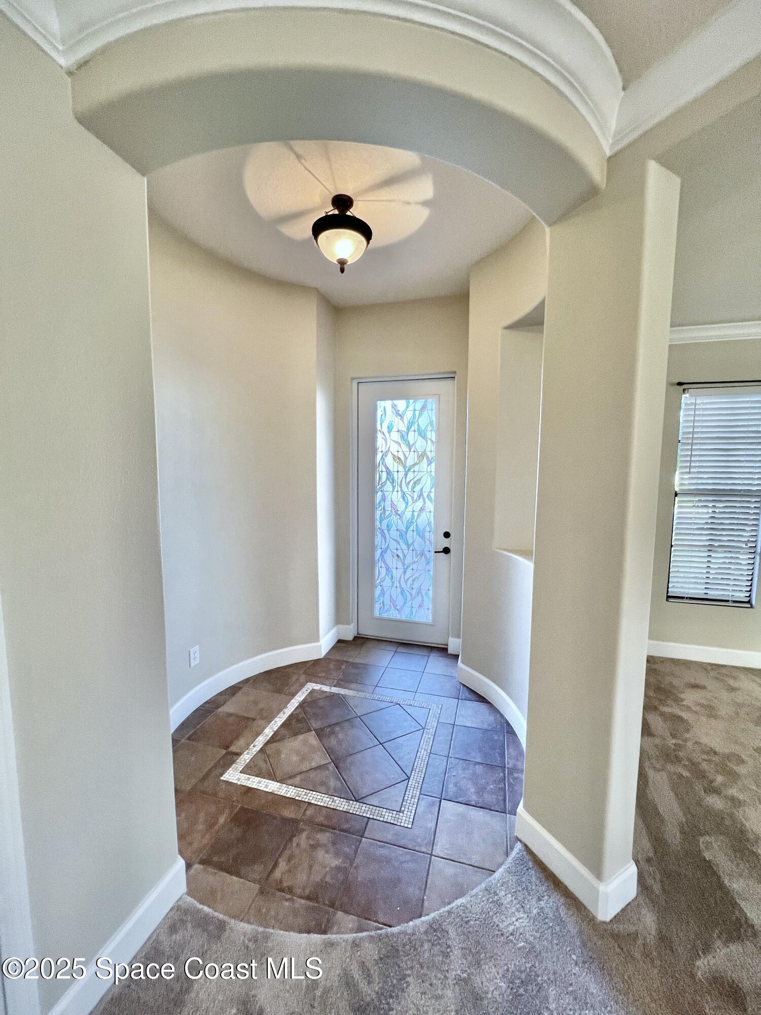 909 Whetstone Place Rockledge, FL 32955 - Photo 5 of 23 Foyer
