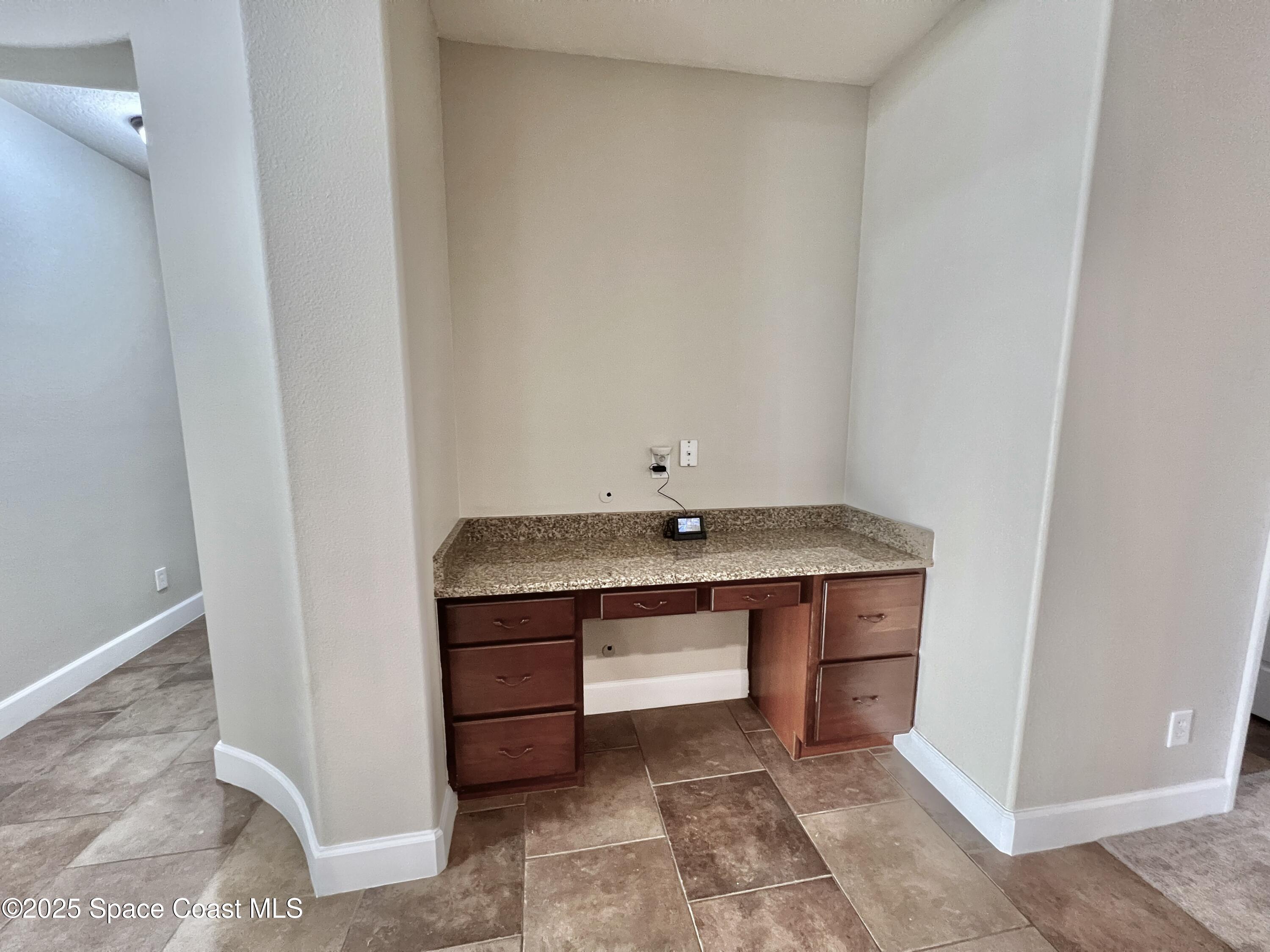 909 Whetstone Place Rockledge, FL 32955 - Photo 8 of 23 Desk