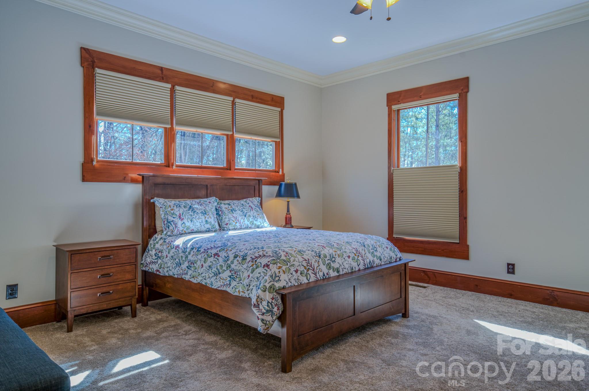 4836 Stream Side Lane, Unit 18 Morganton, NC 28655 - Photo 11 of 46 a bedroom with a bed and window