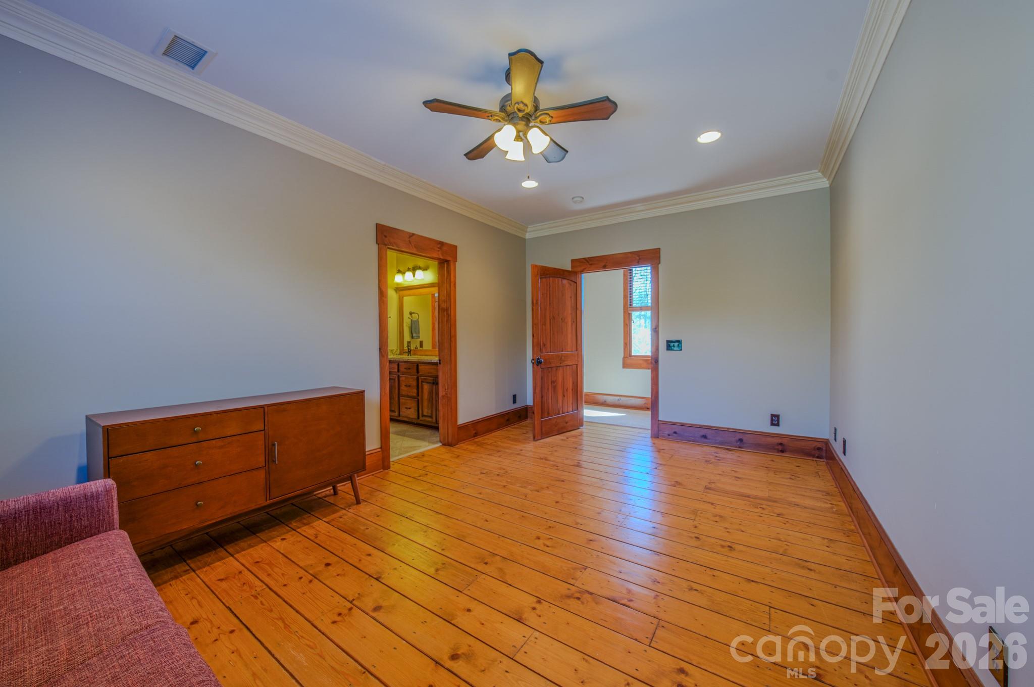 4836 Stream Side Lane, Unit 18 Morganton, NC 28655 - Photo 17 of 46 a view of room with window and ceiling fan