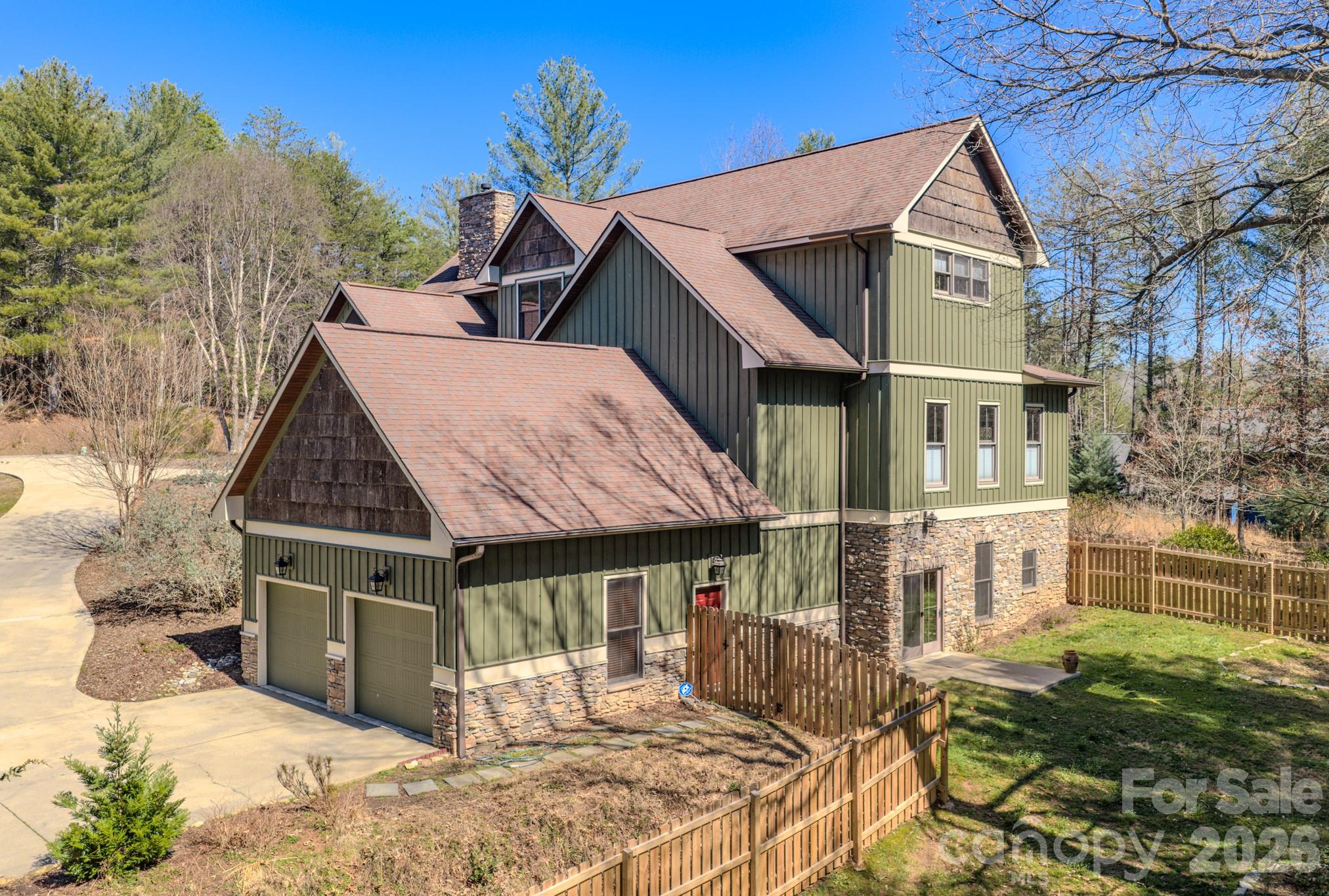 4836 Stream Side Lane, Unit 18 Morganton, NC 28655 - Photo 2 of 46 a front view of a house with a yard
