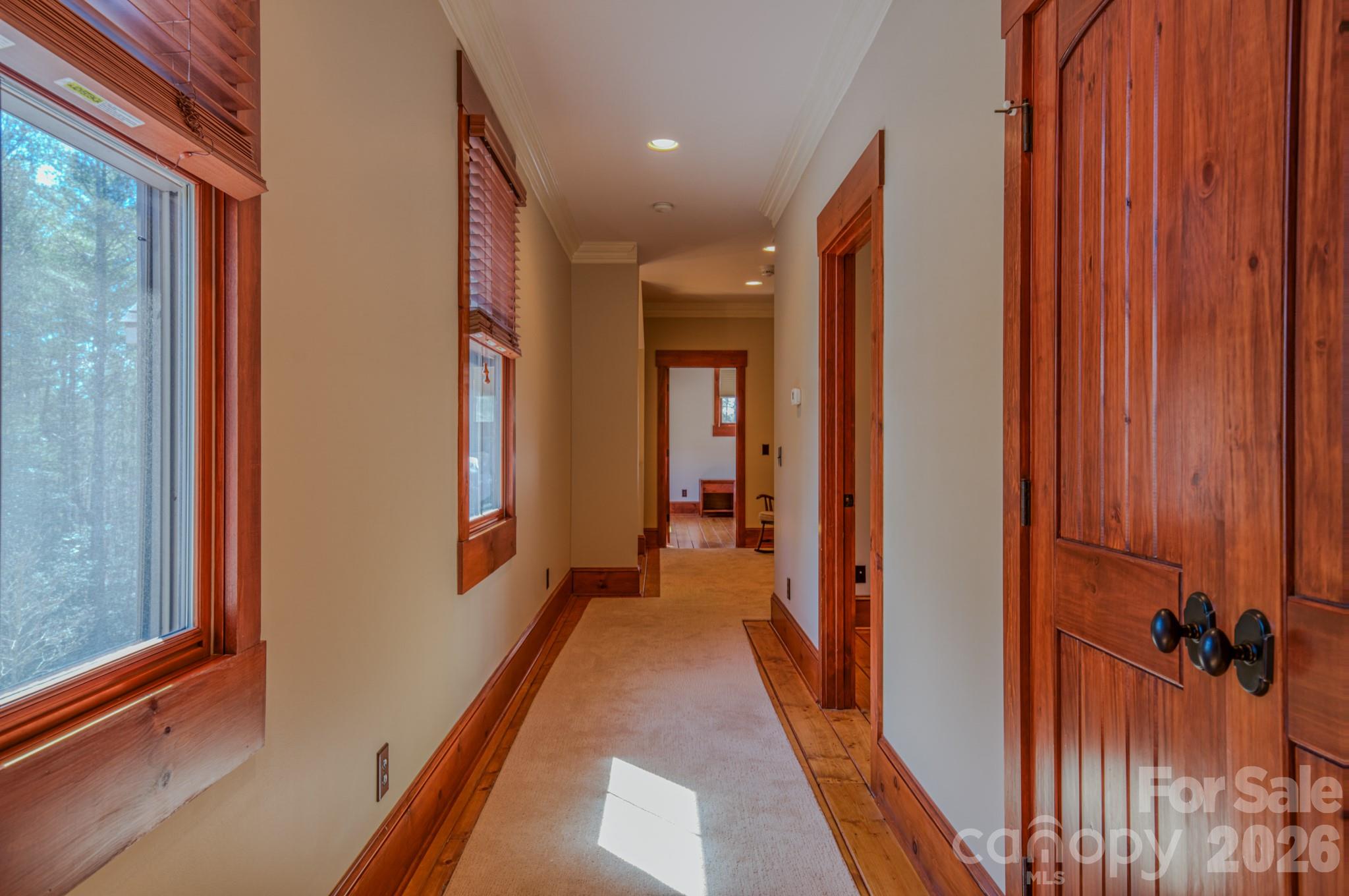 4836 Stream Side Lane, Unit 18 Morganton, NC 28655 - Photo 21 of 46 a view of a hallway with a furniture and a window