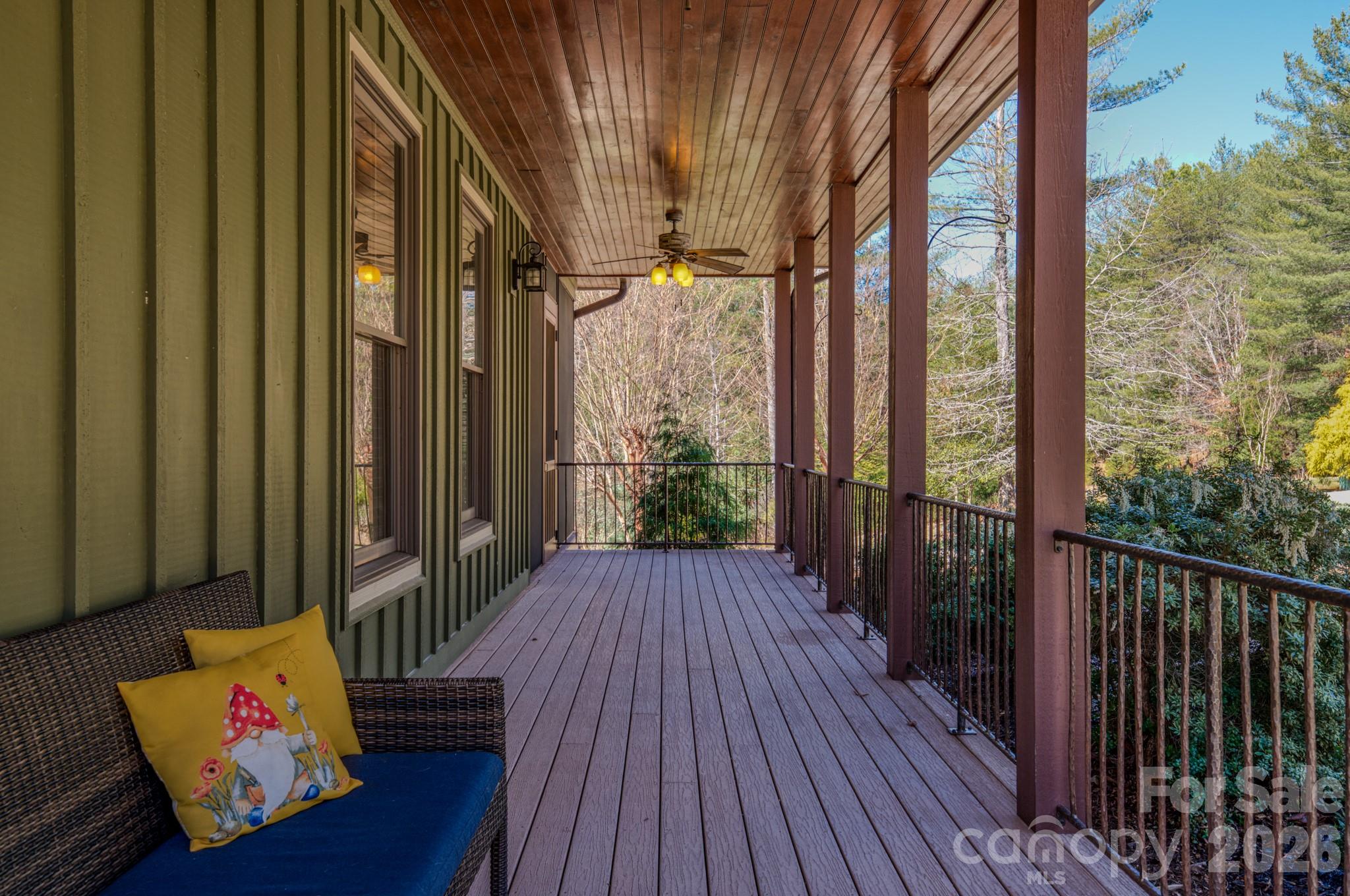 4836 Stream Side Lane, Unit 18 Morganton, NC 28655 - Photo 27 of 46 a view of a balcony with wooden floor and outdoor space