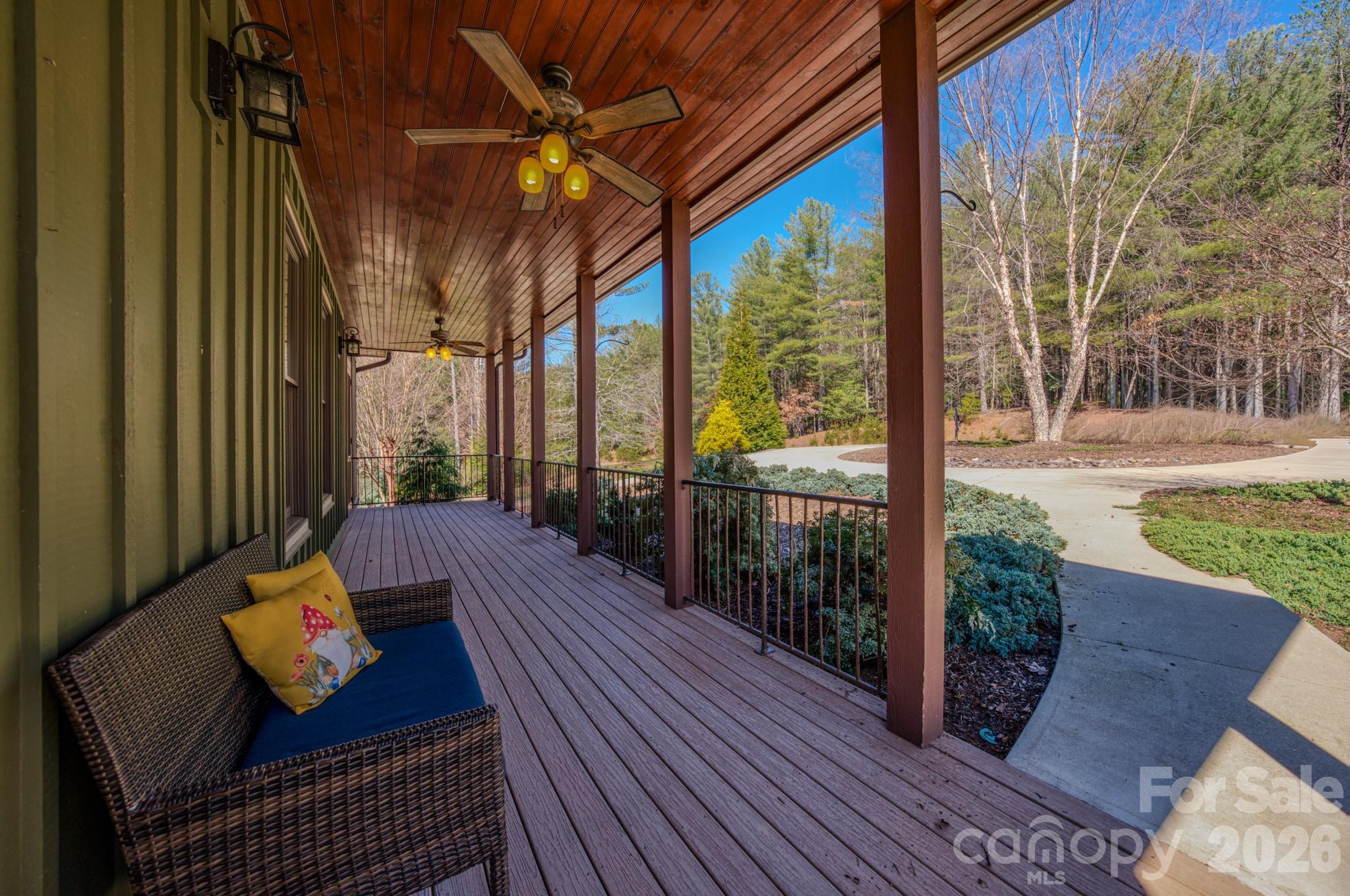 4836 Stream Side Lane, Unit 18 Morganton, NC 28655 - Photo 28 of 46 a balcony with furniture and wooden floor