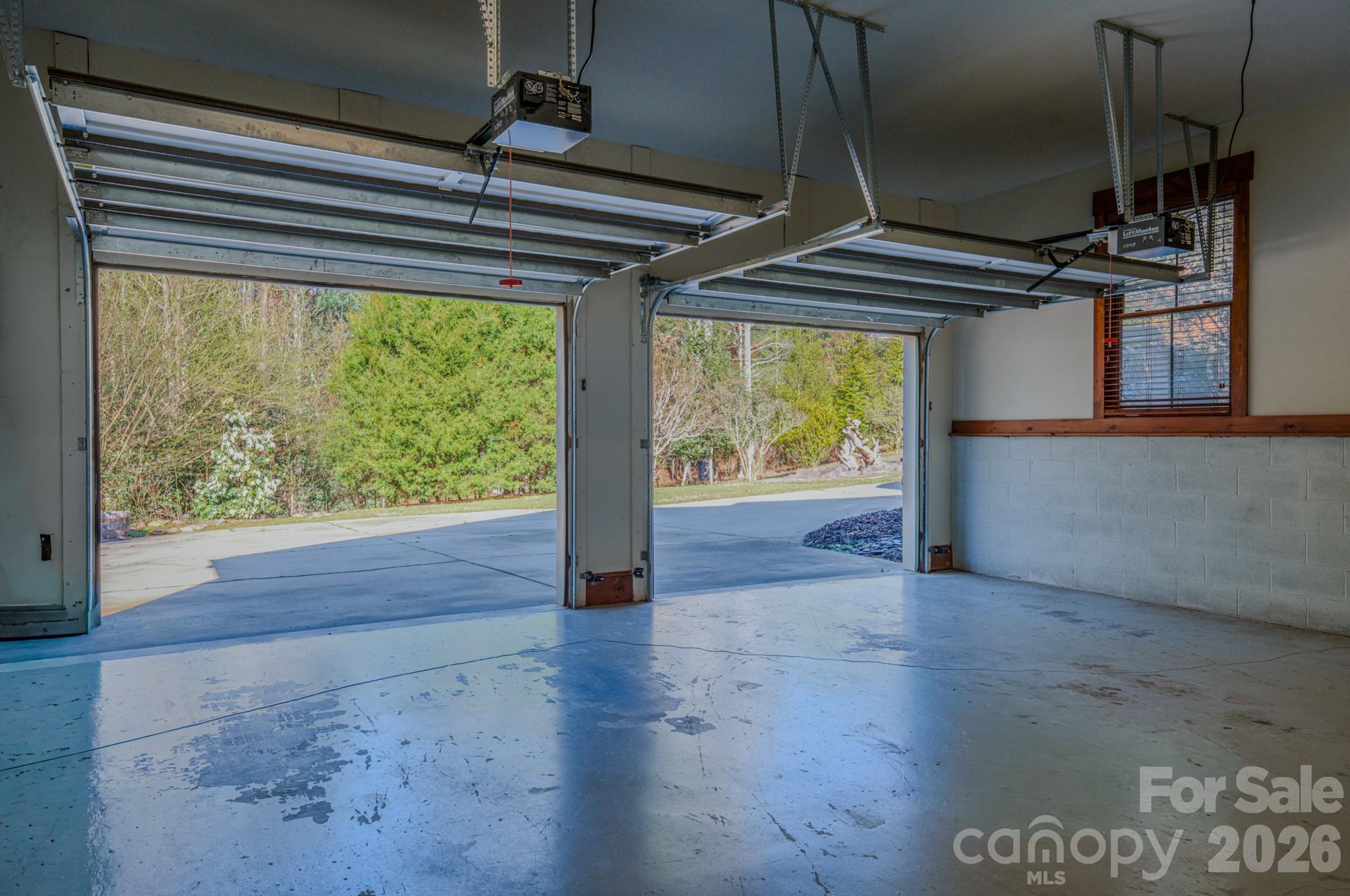 4836 Stream Side Lane, Unit 18 Morganton, NC 28655 - Photo 33 of 46 a view of empty room with wooden floor and fan