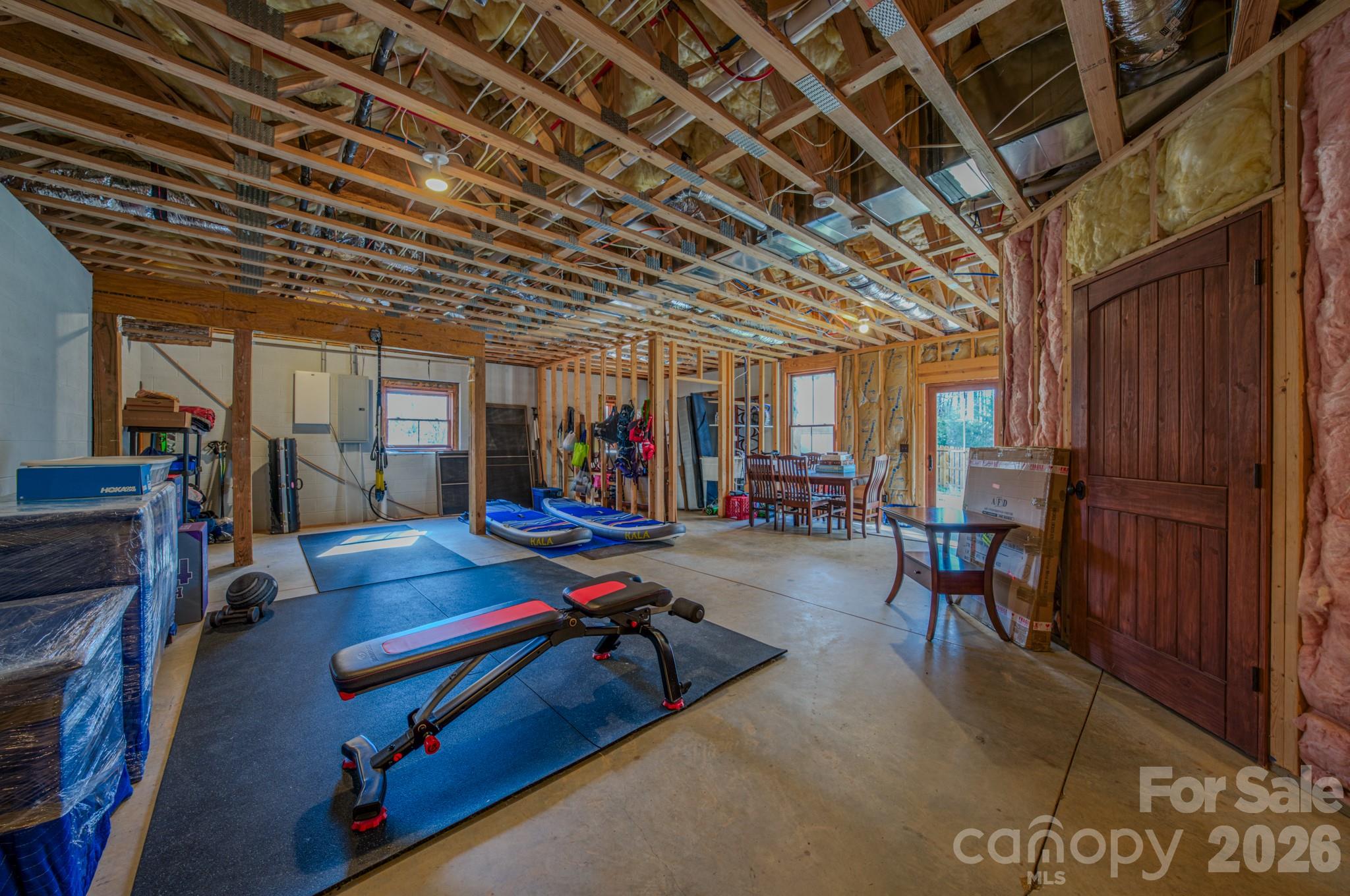 4836 Stream Side Lane, Unit 18 Morganton, NC 28655 - Photo 34 of 46 a view of a room with gym equipment