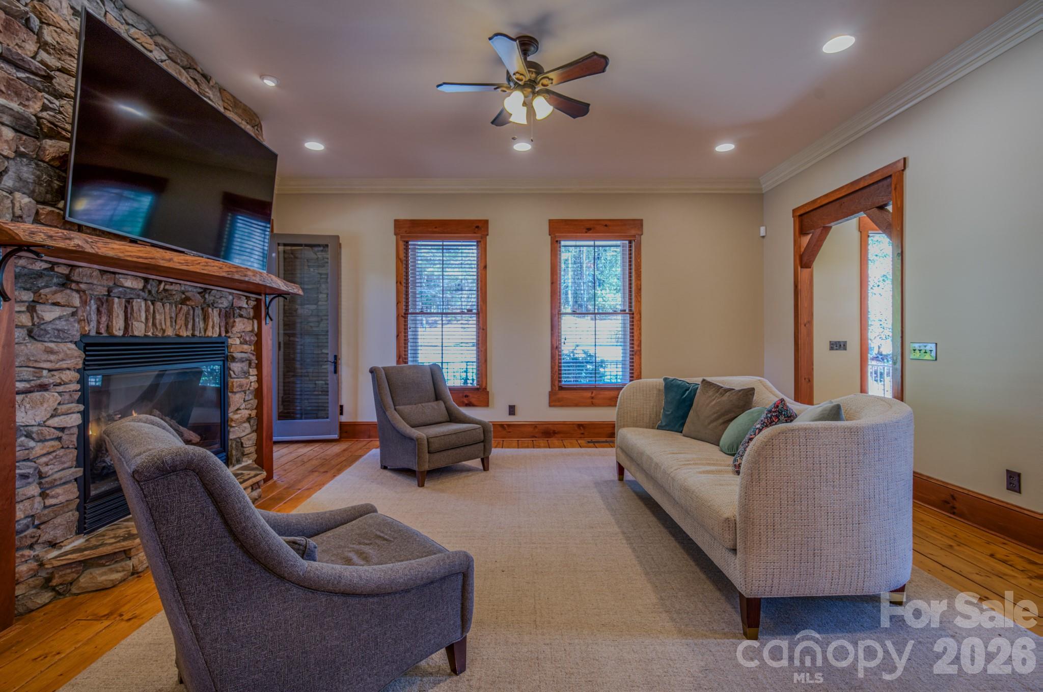 4836 Stream Side Lane, Unit 18 Morganton, NC 28655 - Photo 35 of 46 a living room with furniture and a fireplace