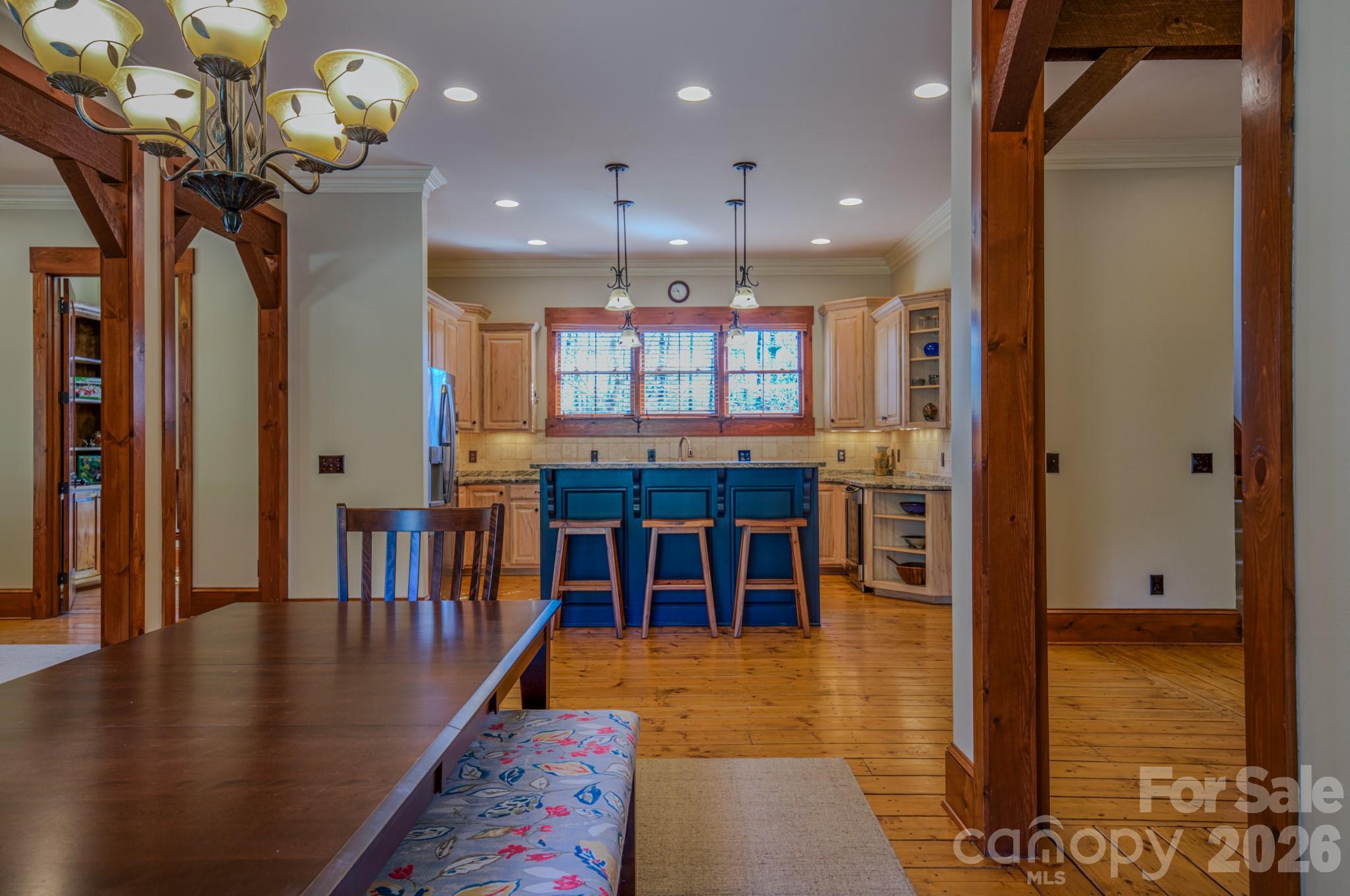 4836 Stream Side Lane, Unit 18 Morganton, NC 28655 - Photo 41 of 46 a view of a hallway with dining room and wooden floor