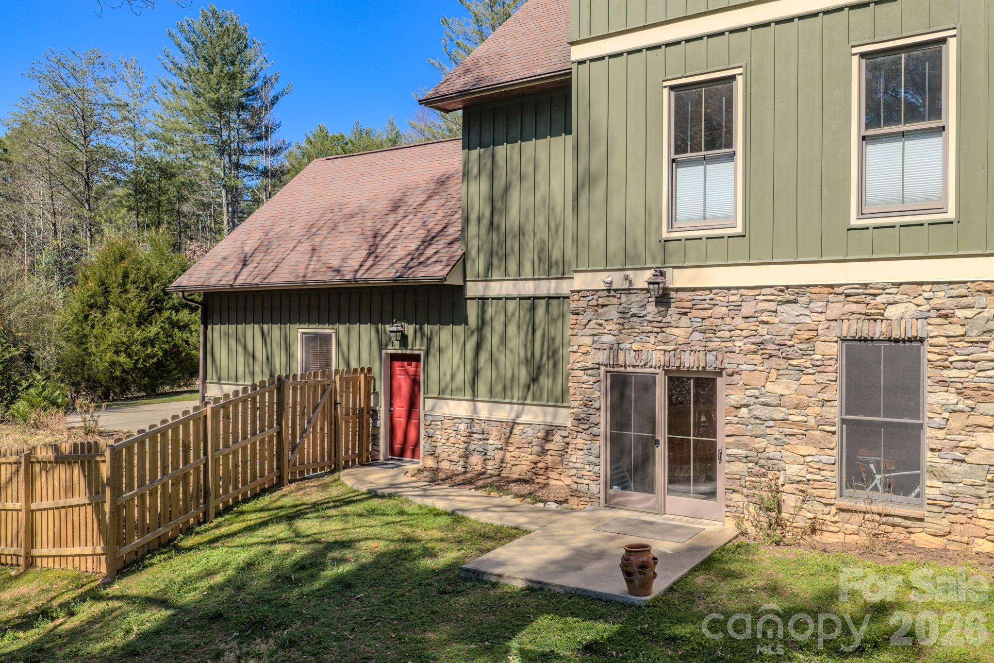 4836 Stream Side Lane, Unit 18 Morganton, NC 28655 - Photo 45 of 46 a view of a house with backyard and porch