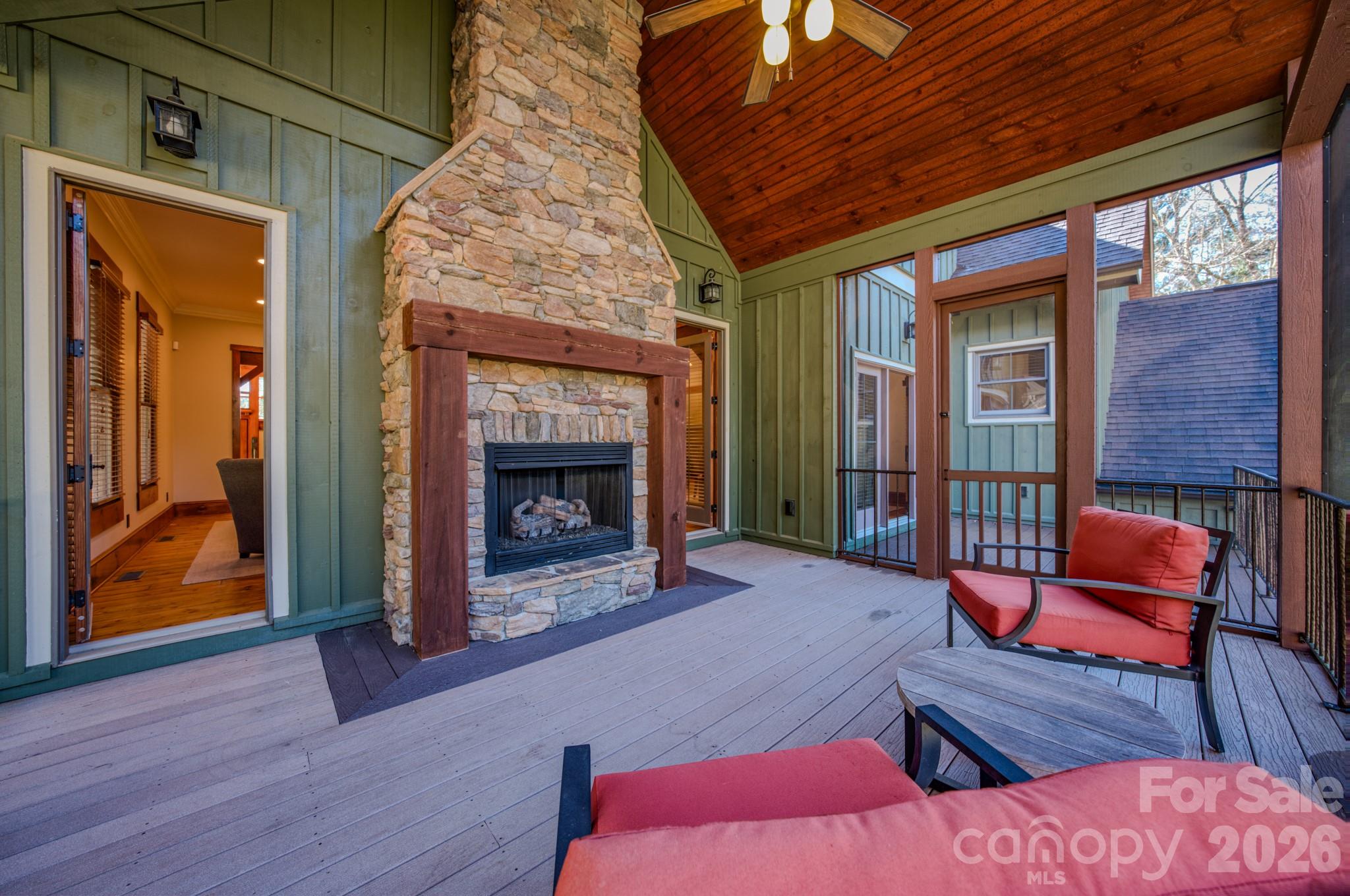 4836 Stream Side Lane, Unit 18 Morganton, NC 28655 - Photo 6 of 46 a outdoor living space with furniture and a fireplace