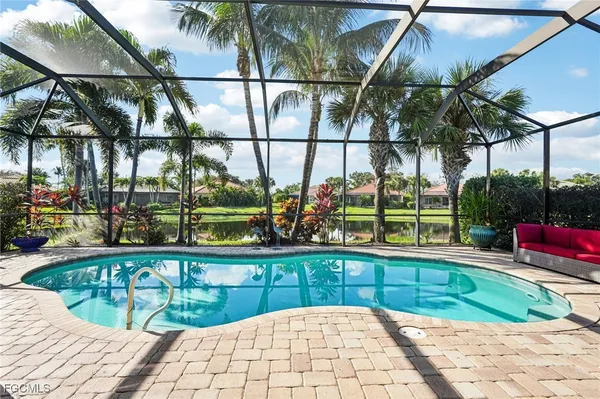 a view of swimming pool with a patio