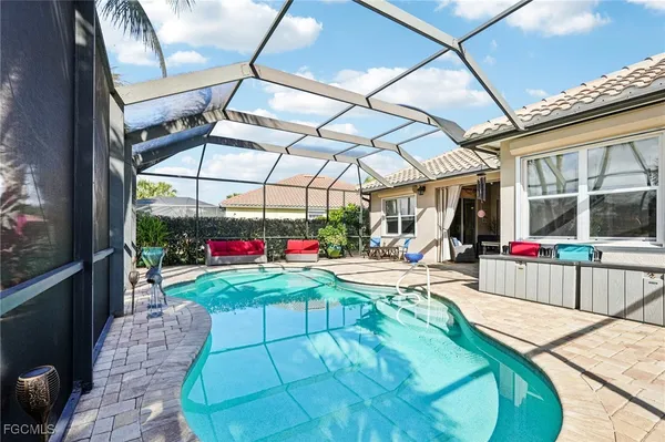 a view of a swimming pool with a porch