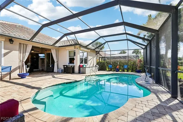 a view of a lake with a house in the background