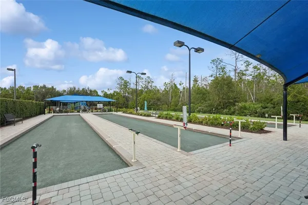 a view of a park with a slide