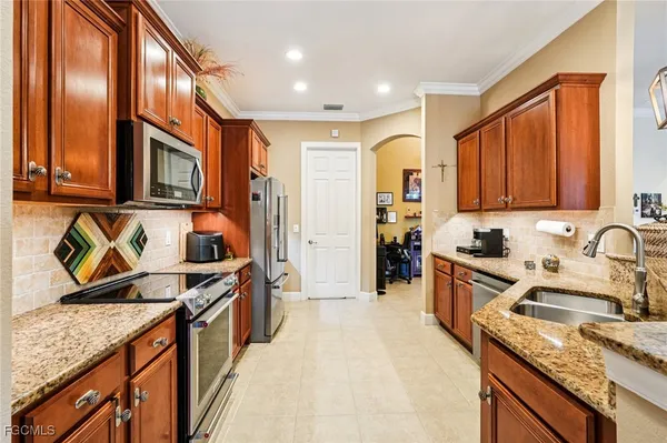 a kitchen with granite countertop lots of counter top space