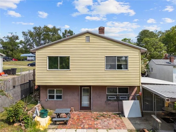 a view of a house with a patio