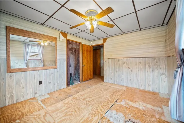a kitchen with stainless steel appliances granite countertop a refrigerator and a stove