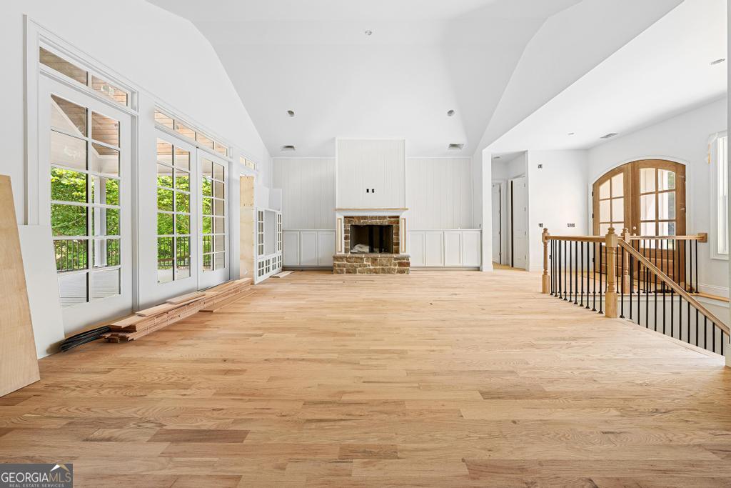 707 Vickery Street Extension Hartwell, GA 30643 - Photo 5 of 36 a view of an empty room with a fireplace and a window