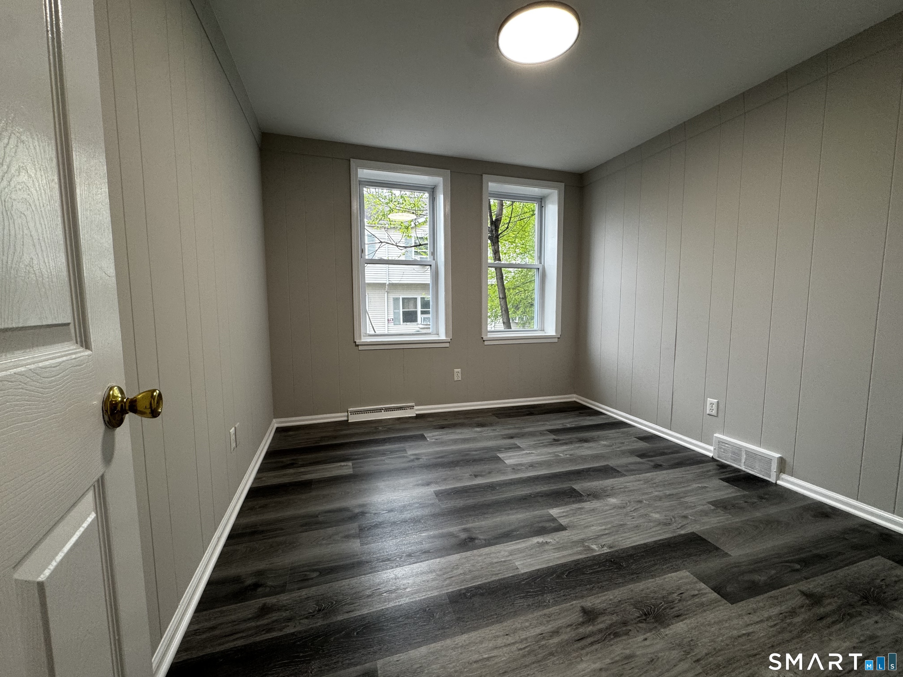 45-51 Cowles Street, Unit 45 Bridgeport, CT 06607 - Photo 19 of 33 a view of empty room with wooden floor