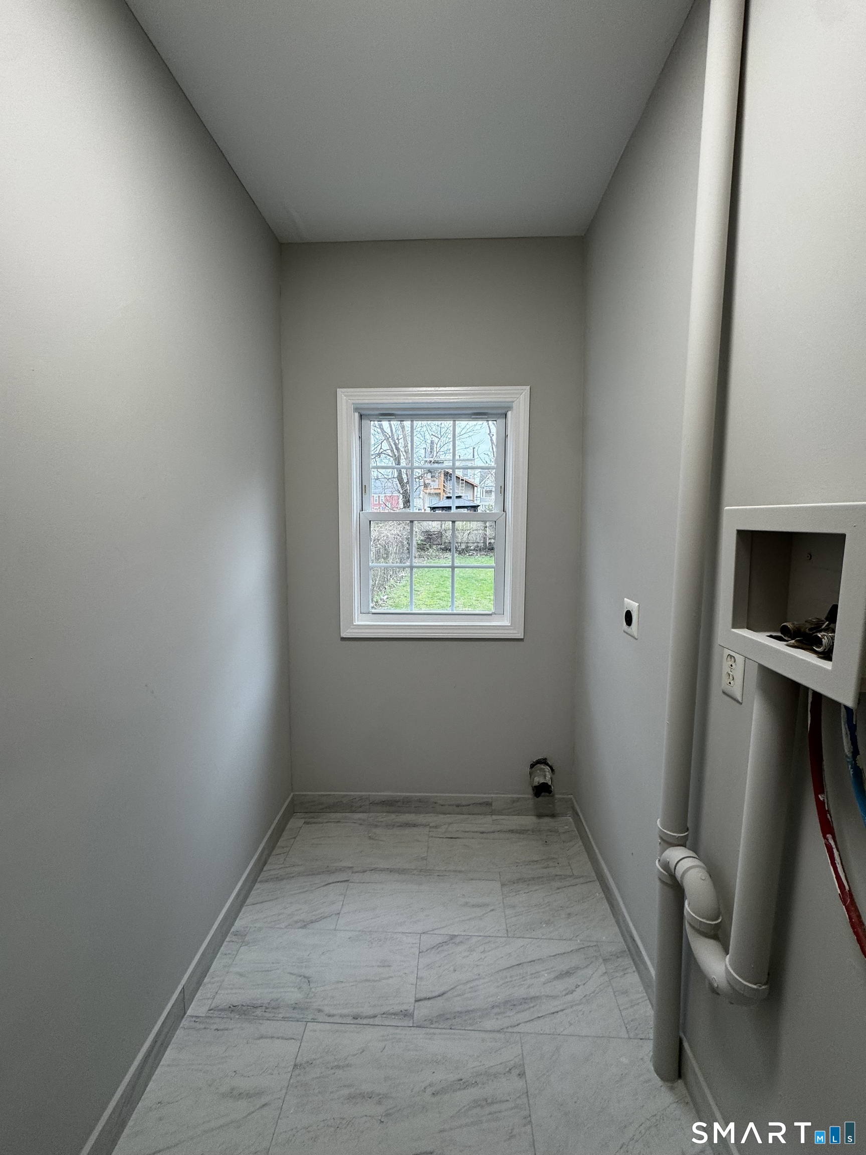 45-51 Cowles Street, Unit 45 Bridgeport, CT 06607 - Photo 27 of 33 an empty room with windows