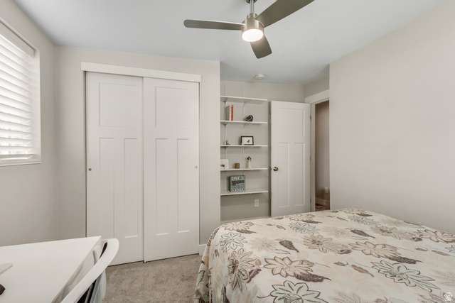 48 Moon Ridge Drive Murray, UT 84107 - Photo 18 of 30 Bedroom featuring light gray walls and plush carpet flooring