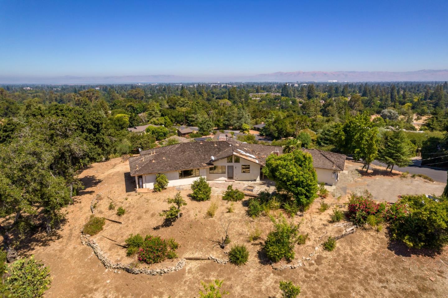 14467 De Bell Road Los Altos Hills, CA 94022 - Photo 5 of 7 a view of a city with a building in the background