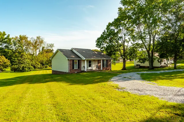 a view of a house with a big yard