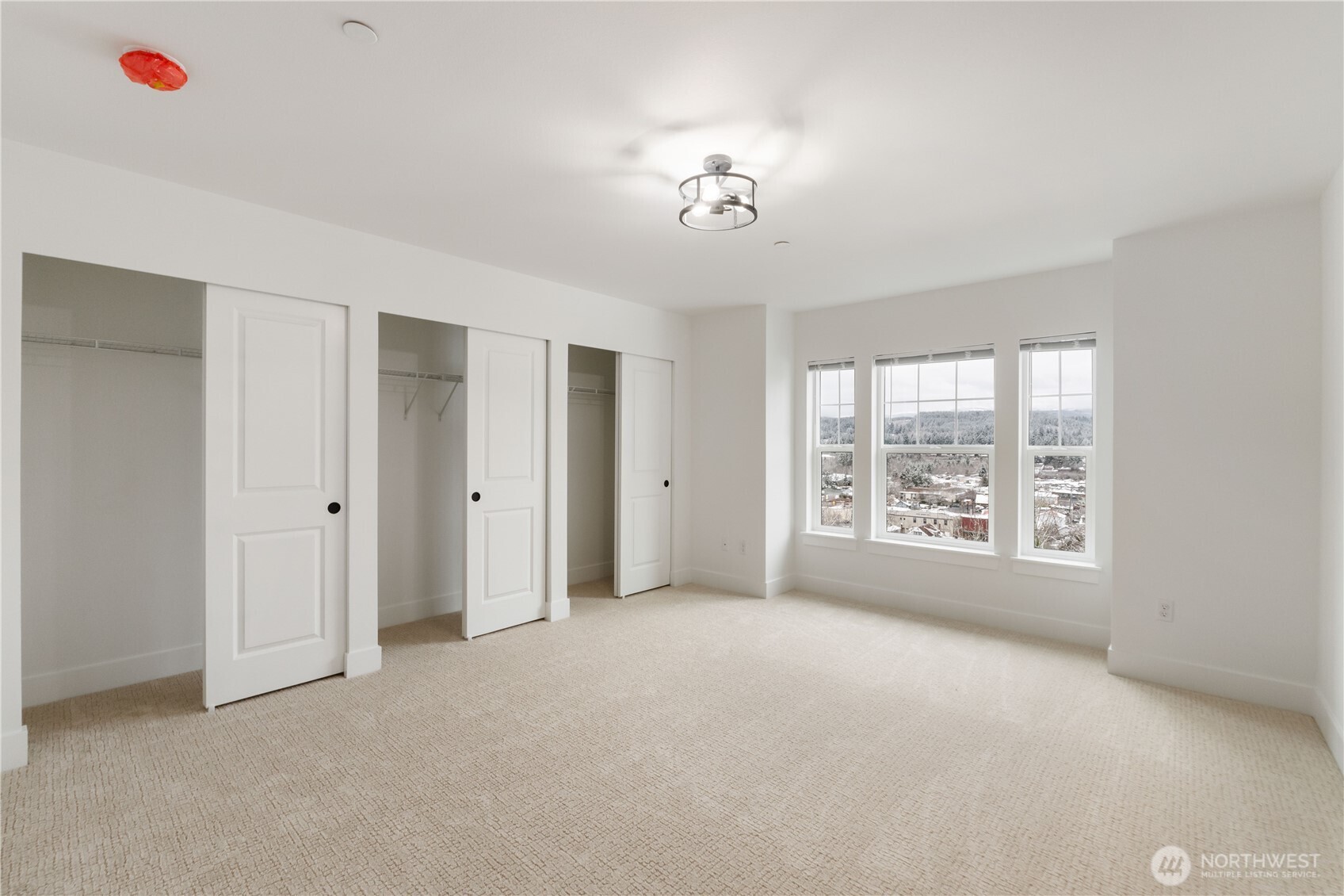 116 Orchard Avenue South, Unit ABCD Eatonville, WA 98328 - Photo 22 of 37 a view of an empty room with a window