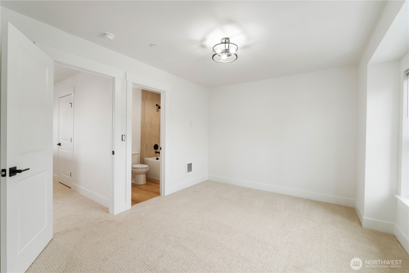 116 Orchard Avenue South, Unit ABCD Eatonville, WA 98328 - Photo 29 of 37 an empty room with a window