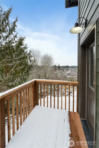 a view of balcony with furniture