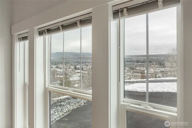 a view of a glass door and a window