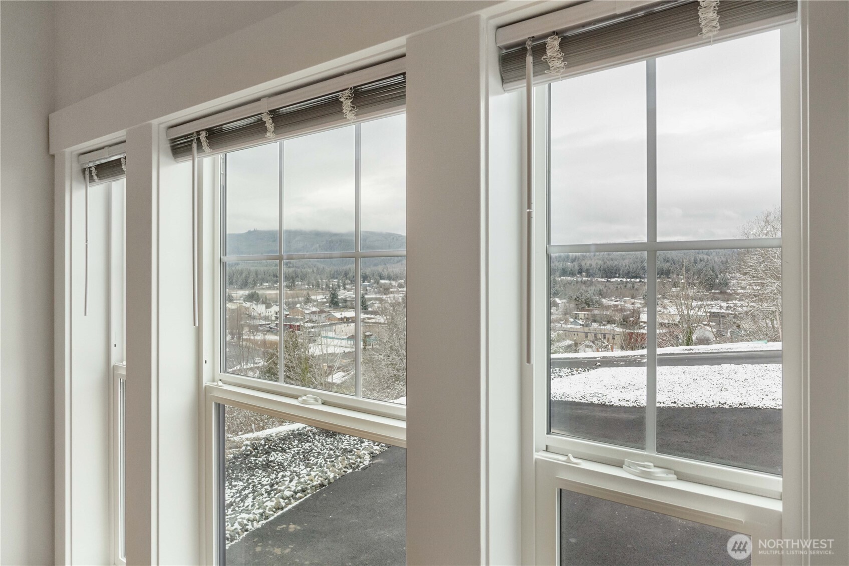 116 Orchard Avenue South, Unit ABCD Eatonville, WA 98328 - Photo 8 of 37 a view of a glass door and a window