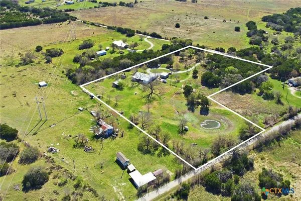 a view of swimming pool with a yard