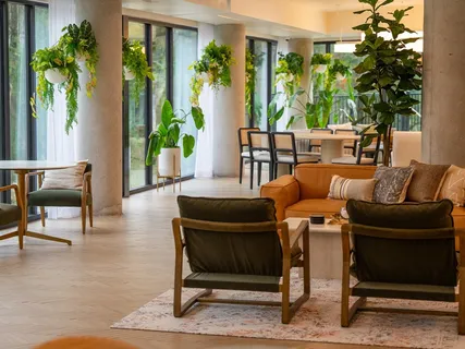 a view of a dining room with furniture window and outside view