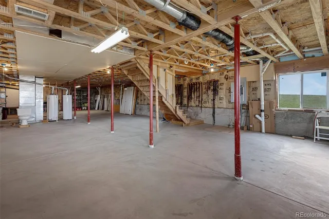 a view of a room with wooden walls