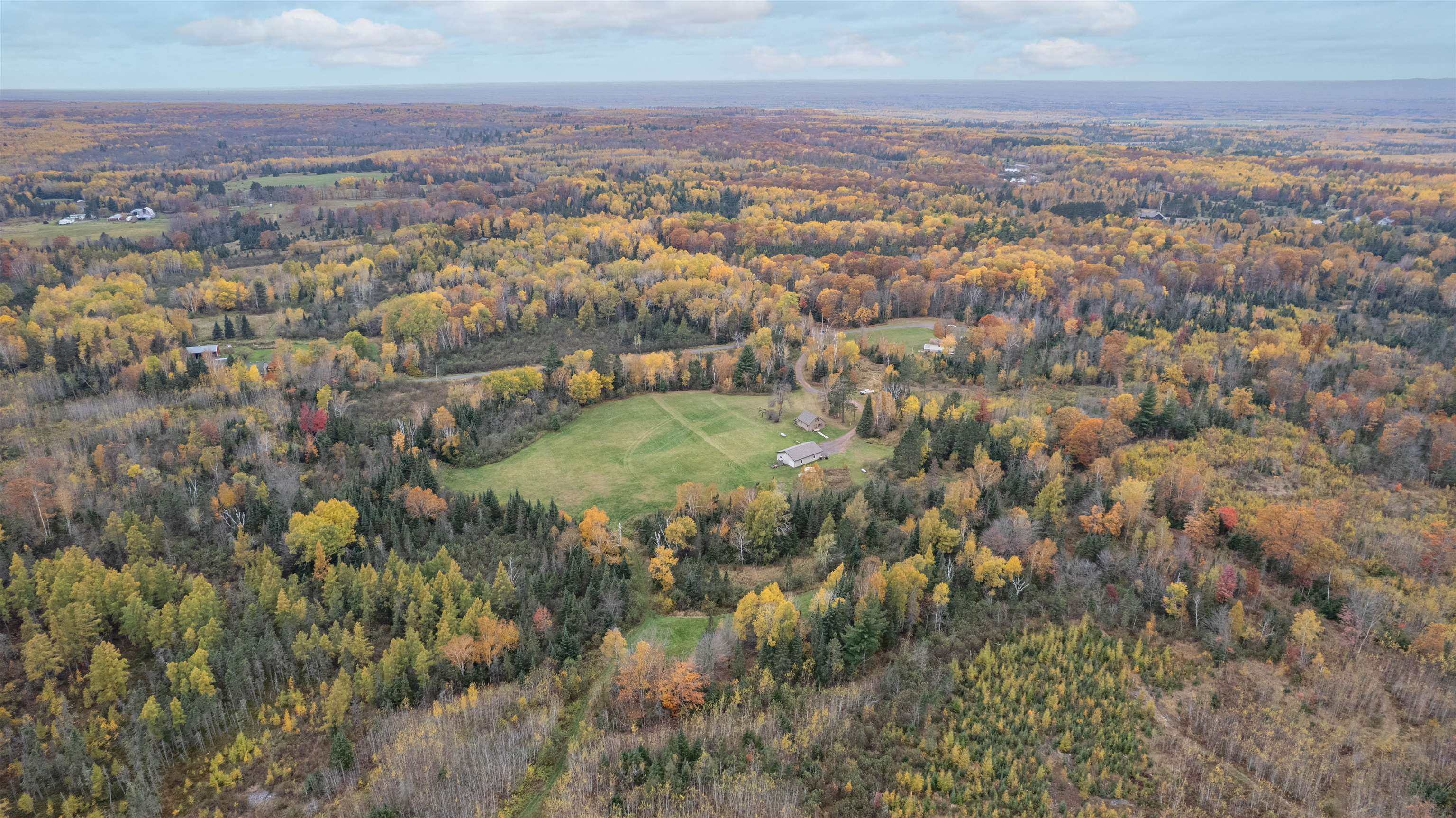 4202 Zachau Road Superior, WI 54880 - Photo 32 of 37 Aerial overview of property's location featuring a forest