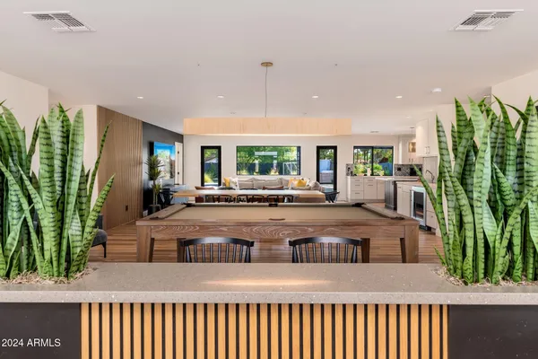 a bedroom with a large bed and a couch