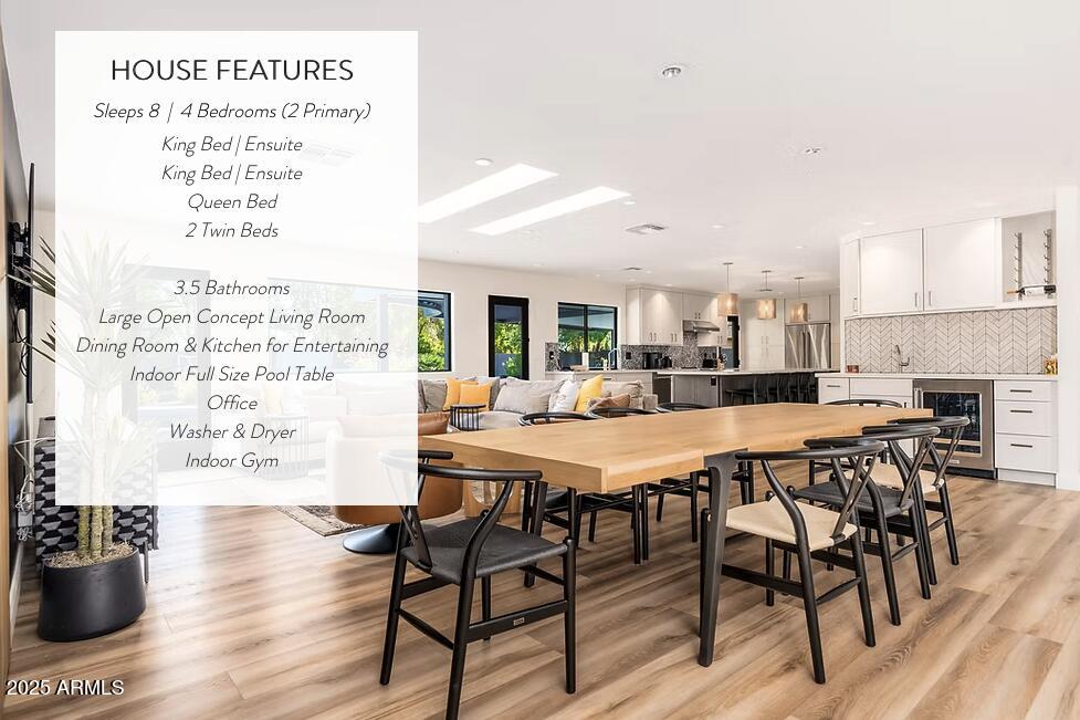 6025 East Charter Oak Road Scottsdale, AZ 85254 - Photo 2 of 115 a view of a dining room with furniture and wooden floor